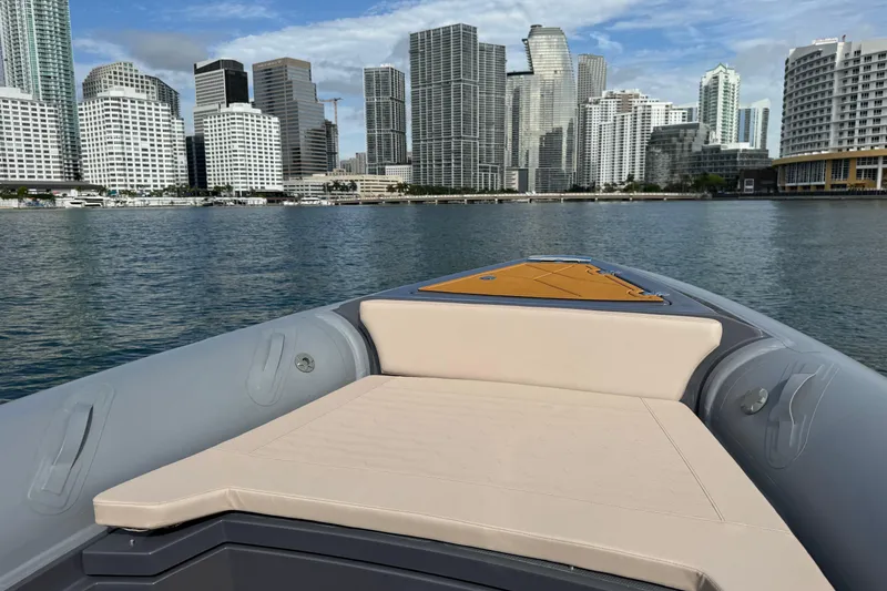 Slide: The Image of Northstar Orion 8 boat with city skyline in the background, 2026 model. - 13