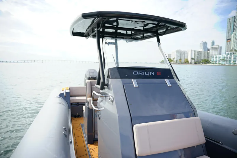 Slide: The Image of 2026 Northstar Orion 8 boat on water, city skyline in background. - 15