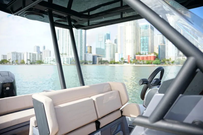 Slide: The Image of 2026 Northstar Orion 8 boat interior with city skyline in the background. - 18