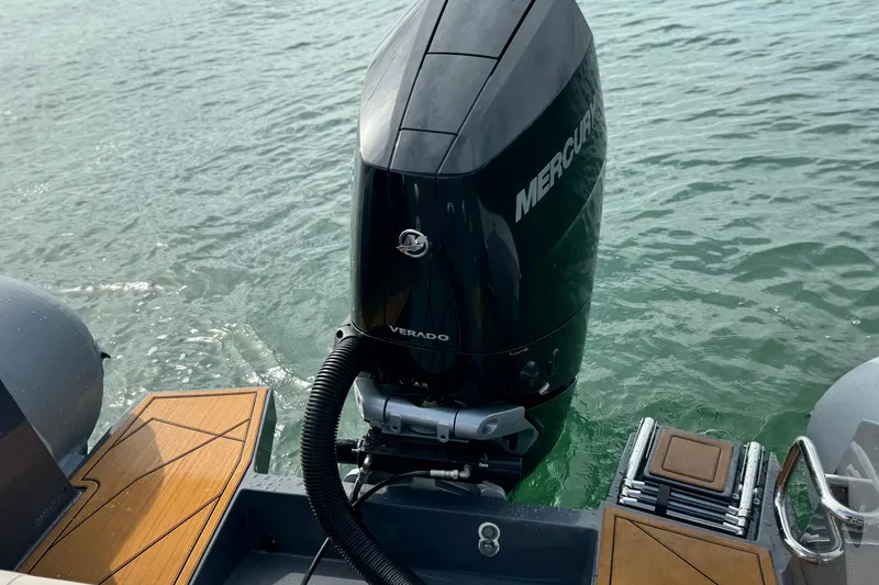 Slide: The Image of Outboard motor on Northstar Orion 8 boat, 2026 model, in water. - 30