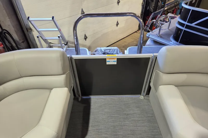 Slide: The Image of Interior view of 2026 Godfrey Xperience 2286 SBX pontoon boat with seating and safety gate. - 11