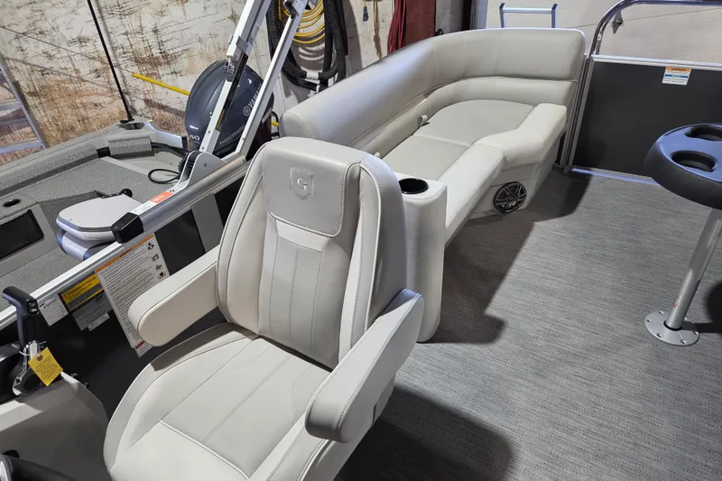 Slide: The Image of 2026 Godfrey Xperience 2286 SBX boat interior with plush seating and modern design. - 8