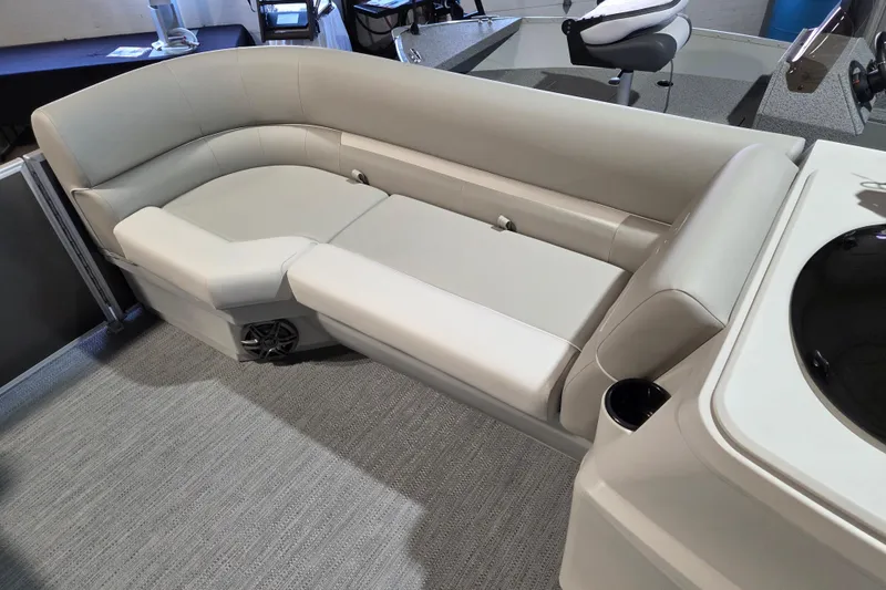 Slide: The Image of 2026 Godfrey Xperience 2286 SBX boat interior with plush seating and modern design. - 9