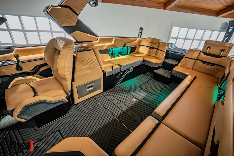 Slide: The Image of Luxurious interior of 2026 MasterCraft XStar 25 boat with tan leather seating. - 8