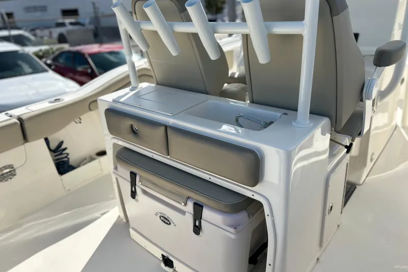 Slide: The Image of 2023 Key West 263 FS boat interior with seating and storage features. - 21