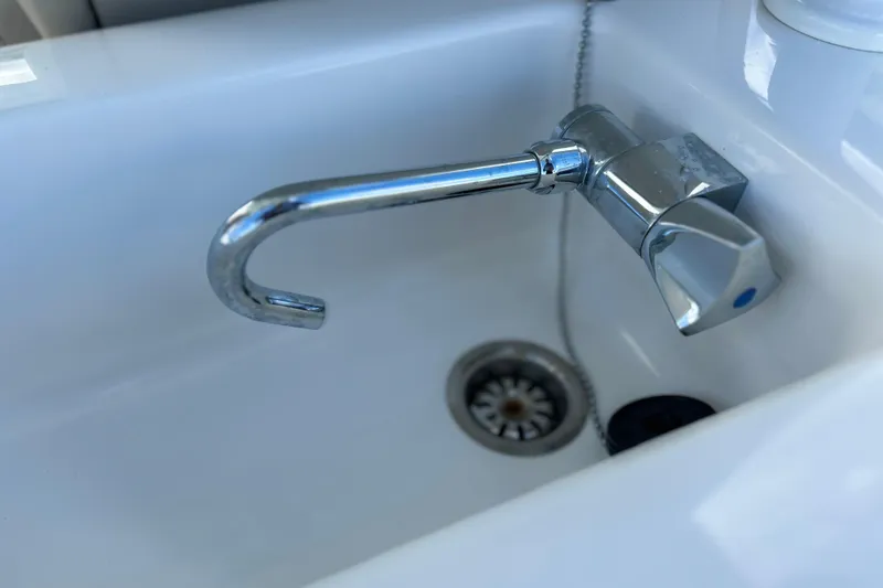 Slide: The Image of Chrome faucet and sink on 2023 Key West 263 FS boat. - 25