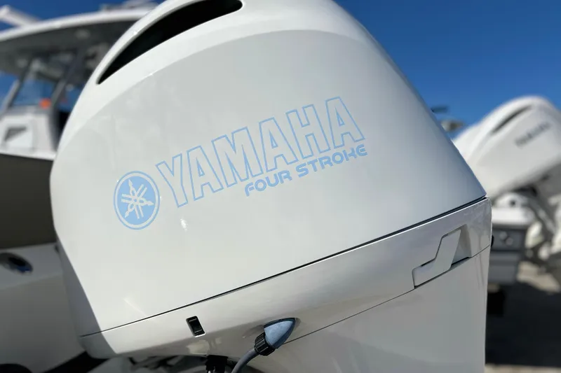 Slide: The Image of Yamaha four-stroke engine on 2023 Key West 263 FS boat, close-up view. - 3