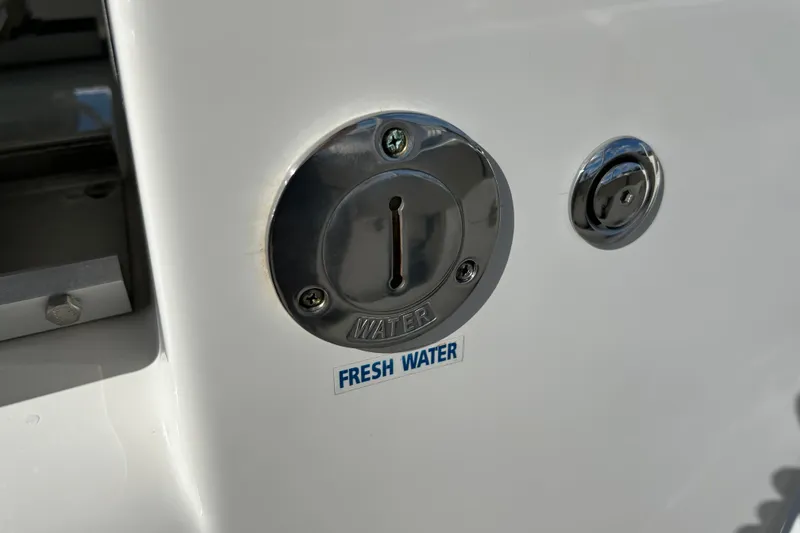 Slide: The Image of Fresh water inlet on 2023 Key West 263 FS boat, chrome finish. - 41