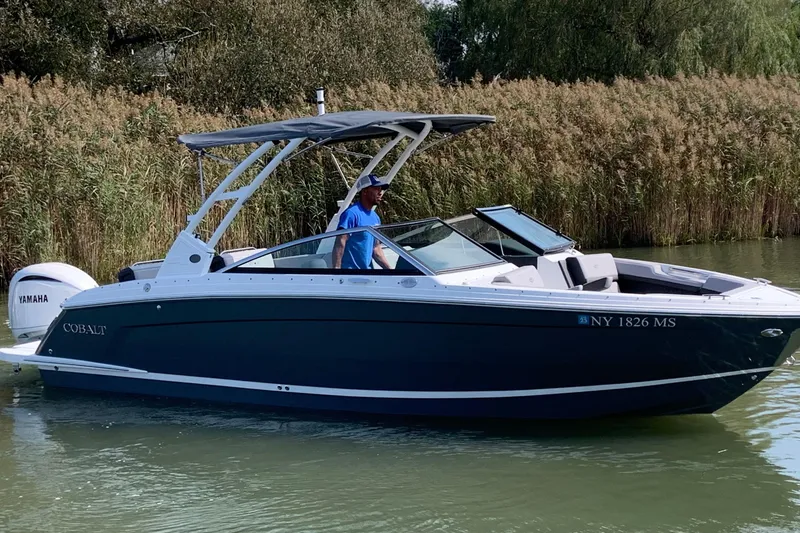 The Image of 2022 Cobalt R6 Outboard boat on calm water with Yamaha engine. - 0