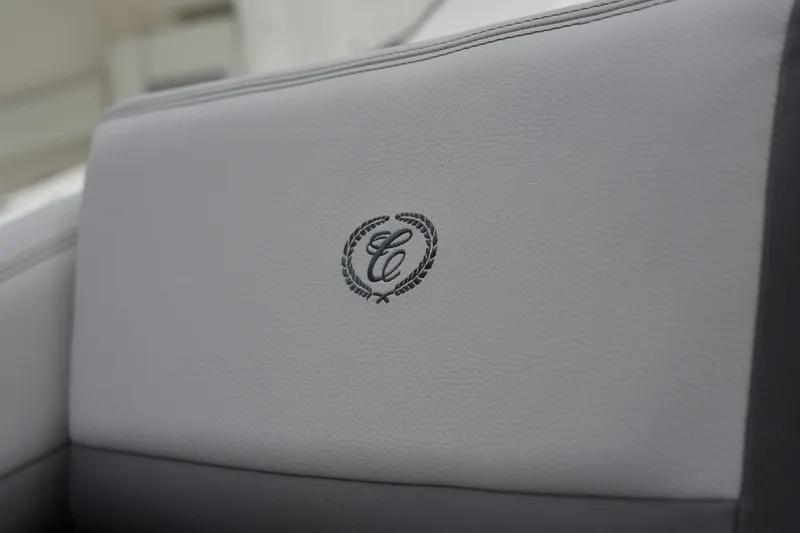 Slide: The Image of Cobalt R6 Outboard 2022 boat seat with embroidered logo detail. - 21