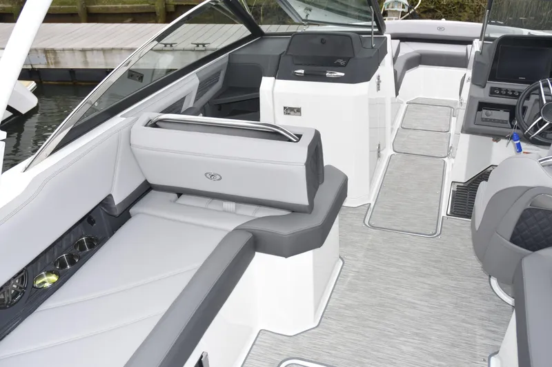 Slide: The Image of 2022 Cobalt R6 Outboard boat interior with sleek seating and modern dashboard design. - 7