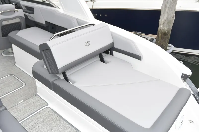 Slide: The Image of 2022 Cobalt R6 Outboard boat interior with gray seating and modern design. - 8