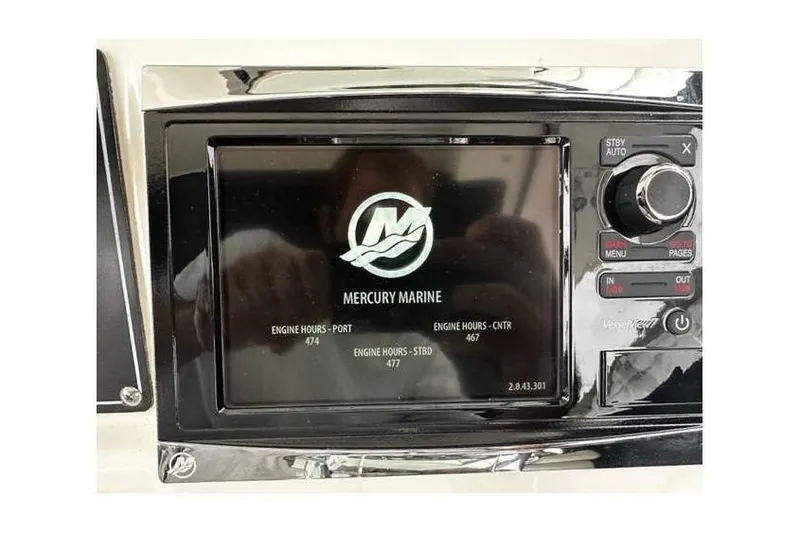 Slide: The Image of Mercury Marine display on 2014 Boston Whaler 370 Outrage showing engine hours. - 11