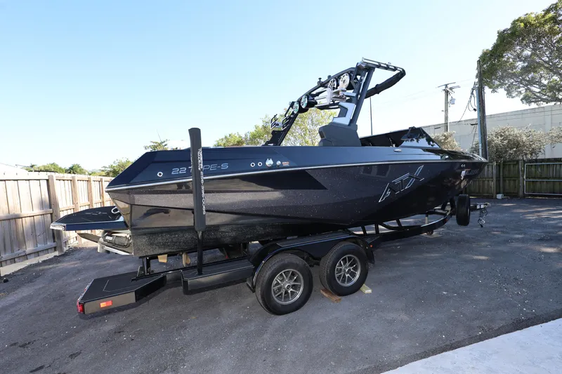 Slide: The Image of 2025 ATX Surf Boats 22 Type-S on trailer, parked outdoors. - 10