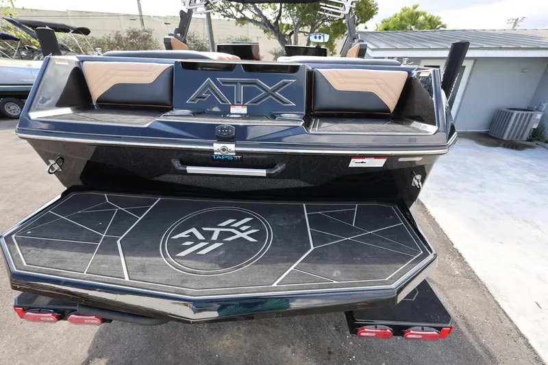 Slide: The Image of 2025 ATX Surf Boats 22 Type-S rear view with swim platform and logo. - 26