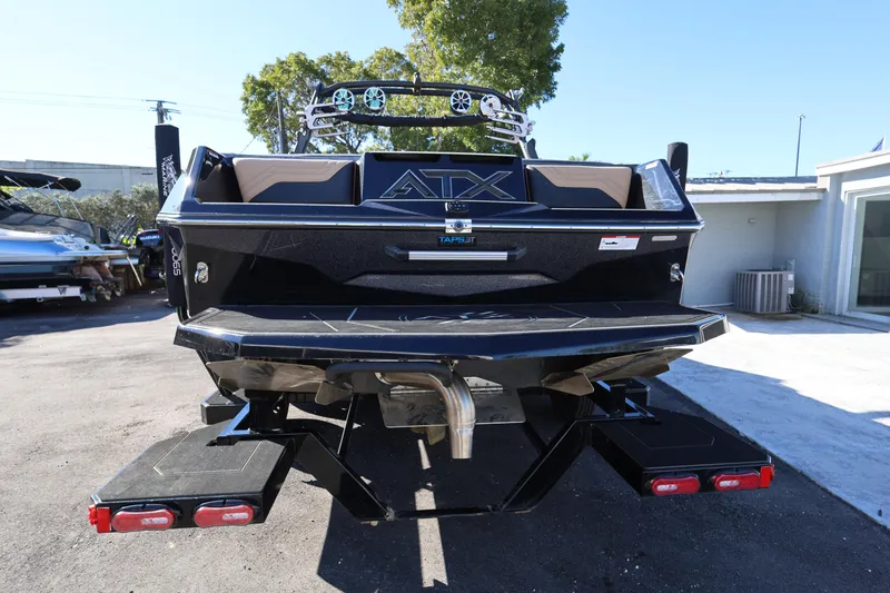 Slide: The Image of 2025 ATX Surf Boats 22 Type-S, rear view, parked outdoors. - 6