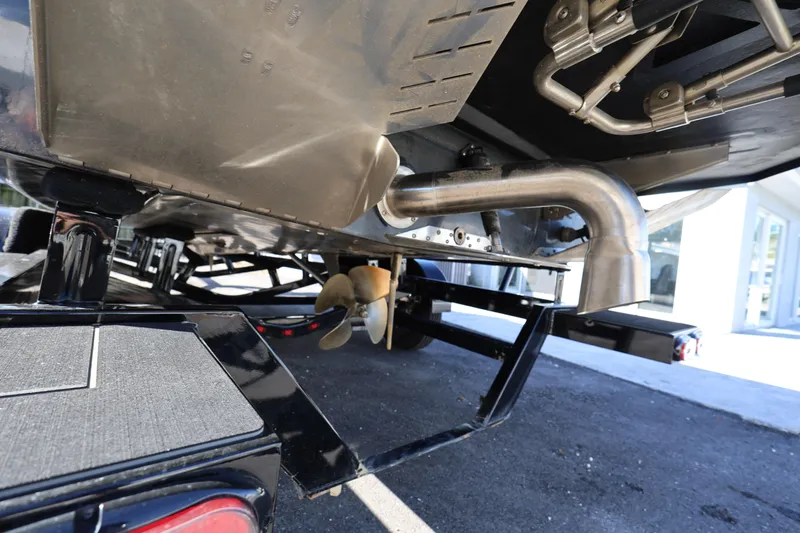Slide: The Image of Underneath view of 2025 ATX Surf Boats 22 Type-S, showcasing propeller and exhaust system. - 8