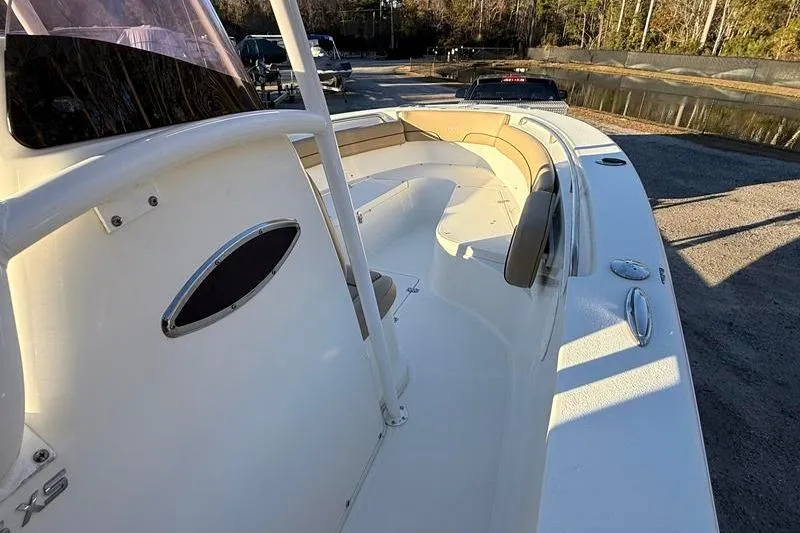 Slide: The Image of 2019 NauticStar 25 XS boat with spacious seating and sleek design. - 20