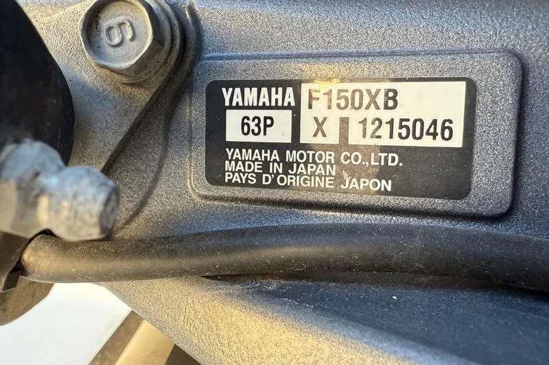 Slide: The Image of Yamaha F150XB engine label on 2019 NauticStar 25 XS boat, made in Japan. - 34