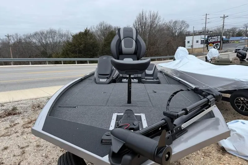 Slide: The Image of 2026 Lowe Stinger 195 Bass boat with modern seating and trolling motor. - 2