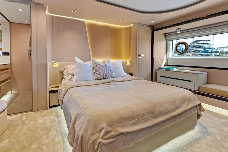 Slide: The Image of Luxurious bedroom interior of 2021 Azimut Fly 78 yacht with modern design and elegant furnishings. - 102