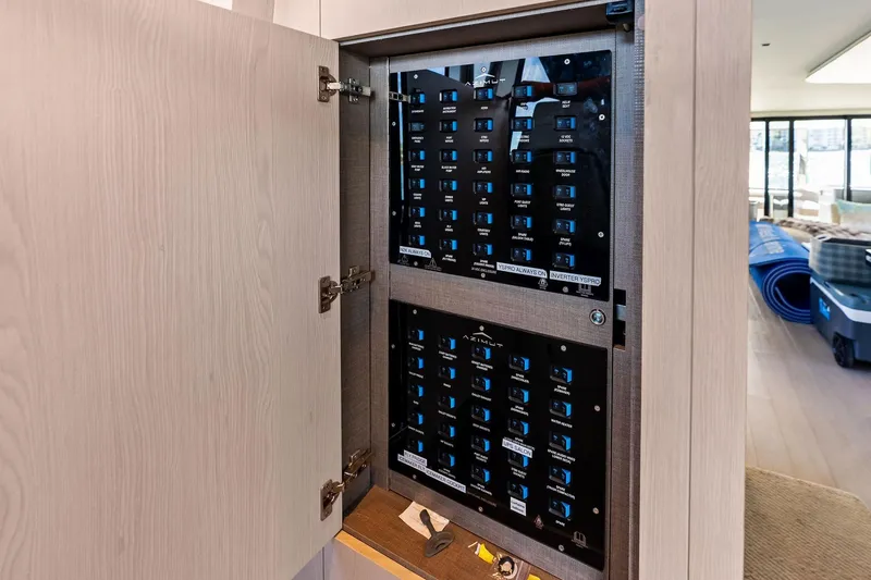 Slide: The Image of Electrical panel inside 2021 Azimut Fly 78 yacht, showcasing control systems. - 109