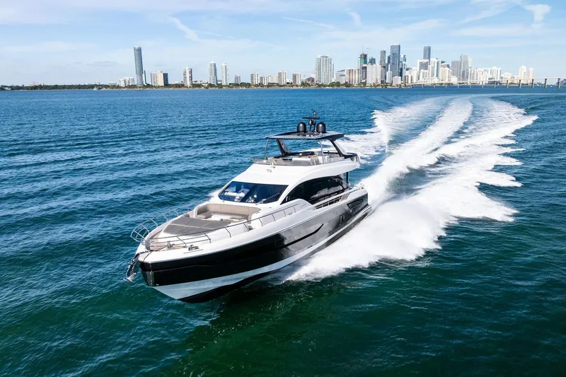 Slide: The Image of Azimut Fly 78 yacht cruising near city skyline, 2021 model. - 15