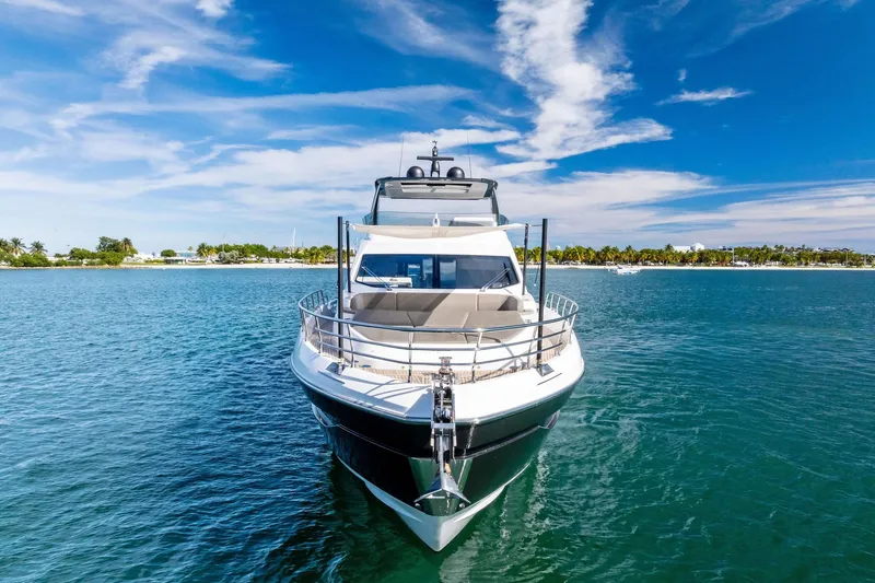 Slide: The Image of Azimut Fly 78 yacht, 2021 model, cruising on clear blue waters under a sunny sky. - 24