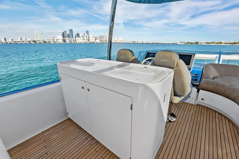 Slide: The Image of 2021 Azimut Fly 78 yacht deck with city skyline view. - 46