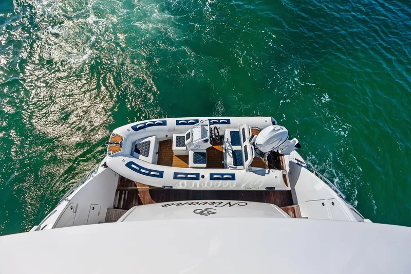 Slide: The Image of 2021 Azimut Fly 78 yacht with tender on turquoise water. - 49
