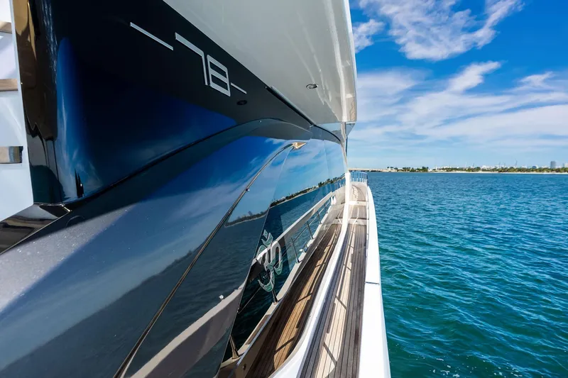 Slide: The Image of Azimut Fly 78 yacht, 2021 model, cruising on clear blue waters under a sunny sky. - 50