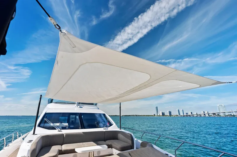 Slide: The Image of Azimut Fly 78 yacht, 2021 model, with sunshade, cruising on a sunny day. - 51