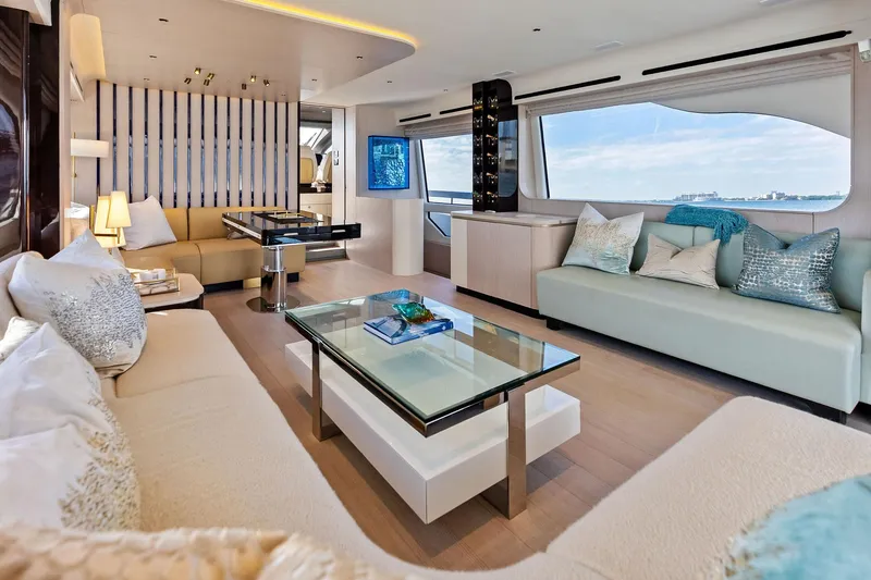 Slide: The Image of Luxurious interior of 2021 Azimut Fly 78 yacht with elegant seating and panoramic windows. - 58
