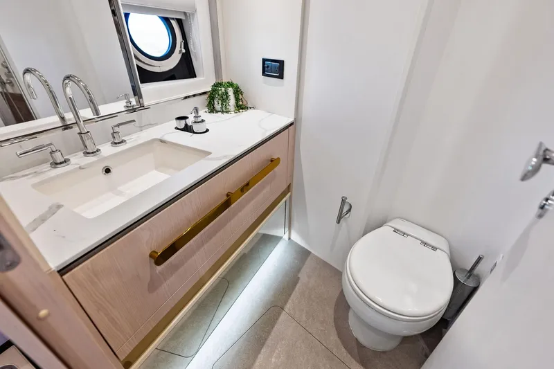 Slide: The Image of Luxurious bathroom in 2021 Azimut Fly 78 yacht with modern fixtures and elegant design. - 81