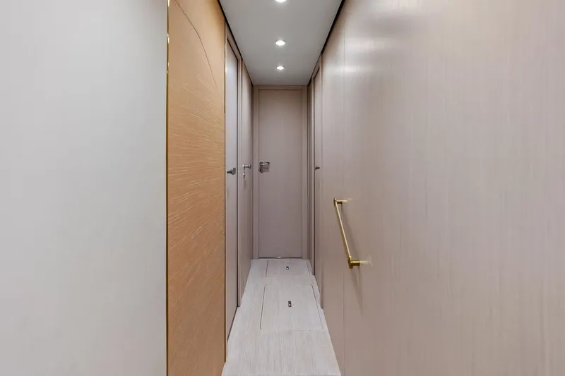 Slide: The Image of Interior hallway of 2021 Azimut Fly 78 yacht with modern design and lighting. - 86