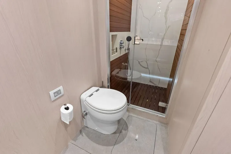Slide: The Image of Luxurious bathroom in 2021 Azimut Fly 78 yacht with modern shower and toilet. - 99
