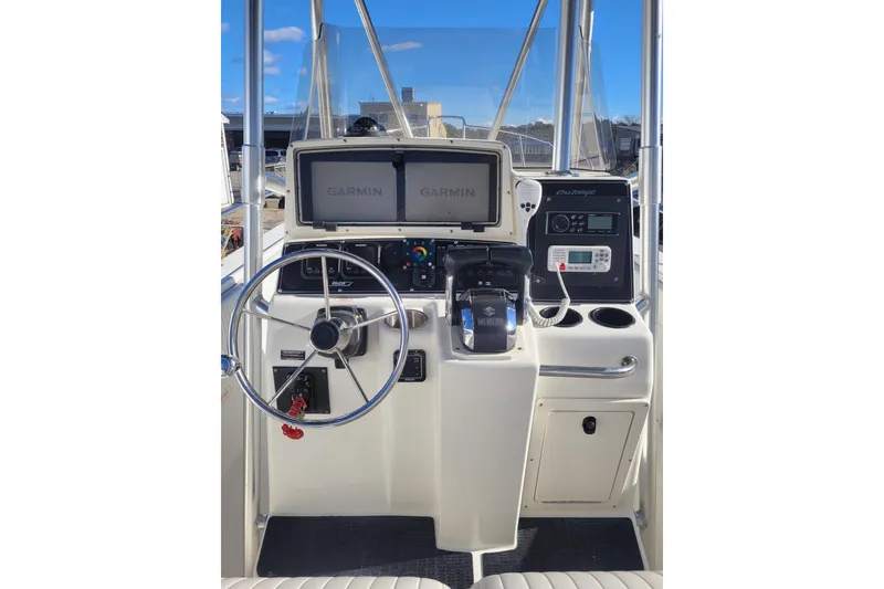 Slide: The Image of 1999 Boston Whaler 26 Outrage boat dashboard with Garmin navigation system. - 5