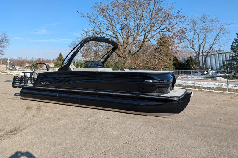 The Image of 2026 Sylvan G5 CLZ pontoon boat parked outdoors on a sunny day. - 0