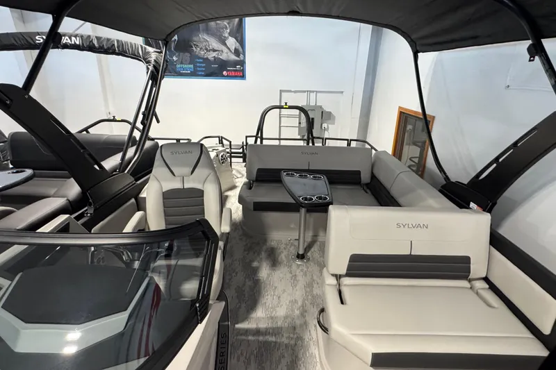Slide: The Image of 2026 Sylvan G5 CLZ boat interior with modern seating and cup holders. - 14