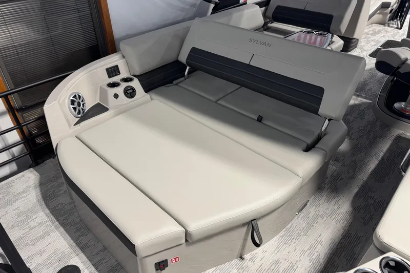 Slide: The Image of 2026 Sylvan G5 CLZ boat interior with luxurious seating and built-in speakers. - 20