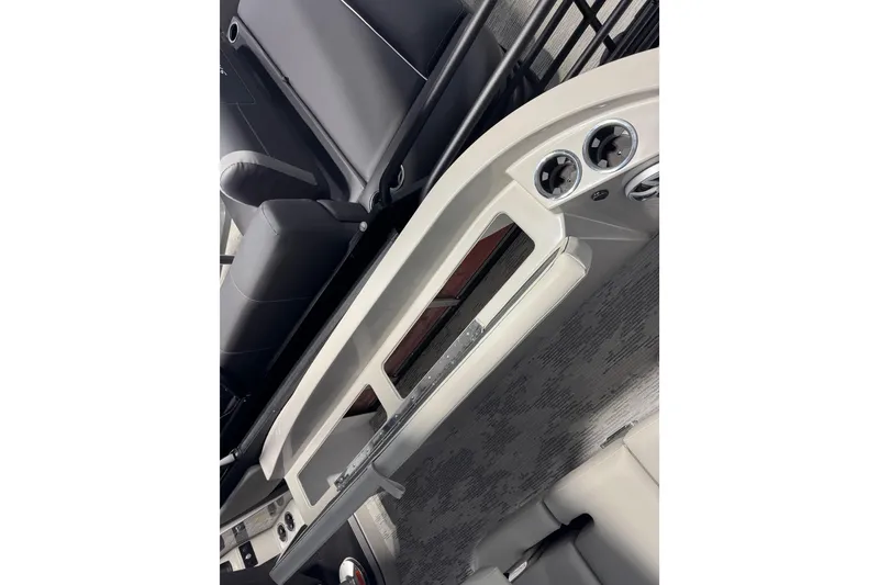 Slide: The Image of Interior view of 2026 Sylvan G5 CLZ boat, featuring sleek dashboard and seating. - 23