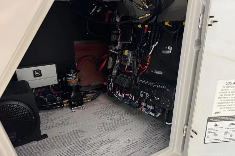 Slide: The Image of Electrical system inside 2026 Sylvan G5 CLZ boat, showcasing wiring and components. - 24