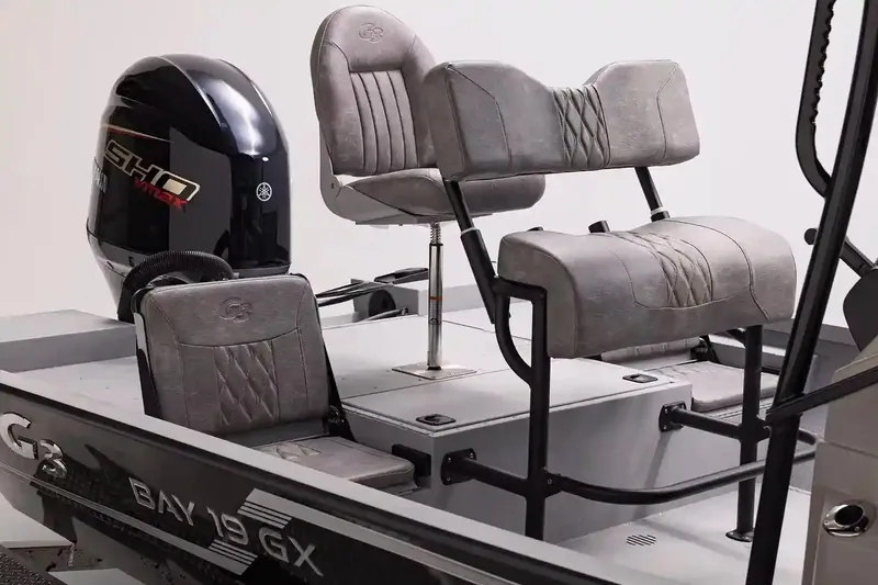 Slide: The Image of Manufacturer Provided Image: 2026 G3 Bay 19 GX boat interior with gray seating and Yamaha outboard motor. - 4