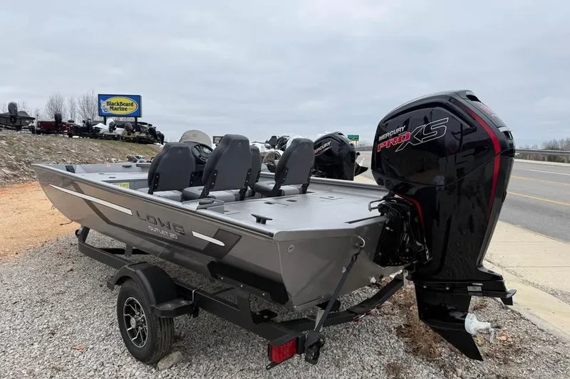 Slide: The Image of 2026 Lowe Outlet 20 boat with Mercury Pro XS engine on a trailer. - 7