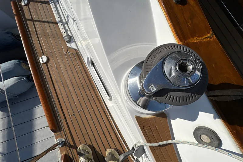 Slide: The Image of Deck of 2001 North Wind 56 yacht with winch and wooden details. - 12