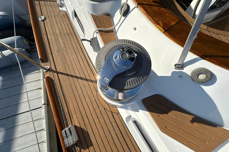 Slide: The Image of Deck of 2001 North Wind 56 yacht with winch and wooden finish. - 15