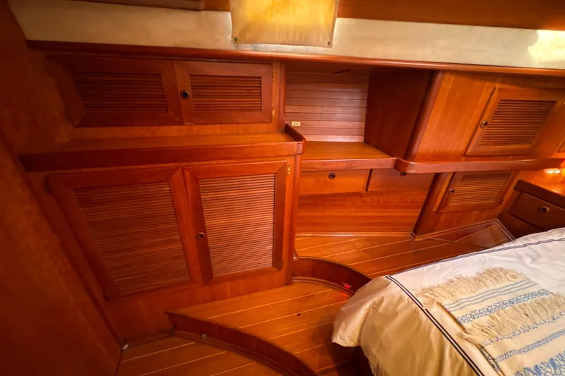 Slide: The Image of Luxurious wooden interior of a 2001 North Wind 56 yacht cabin. - 39