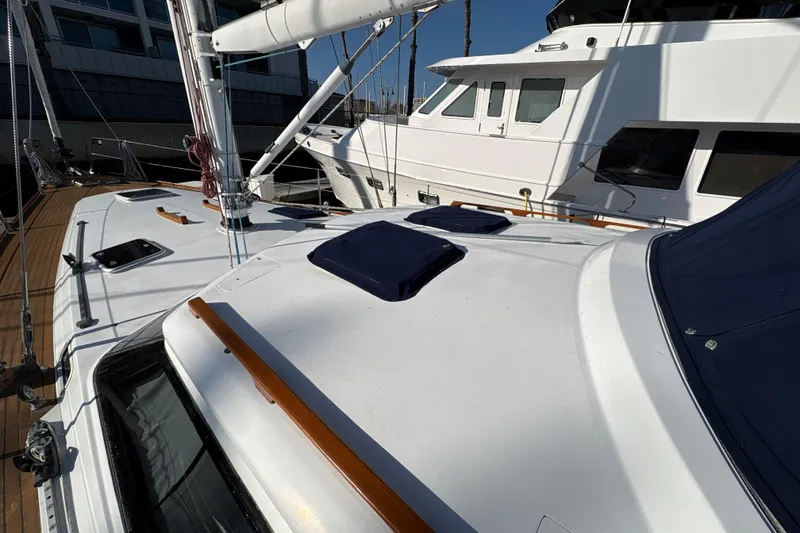 Slide: The Image of Sailboat deck view of 2001 North Wind 56, featuring sleek design and modern fittings. - 7