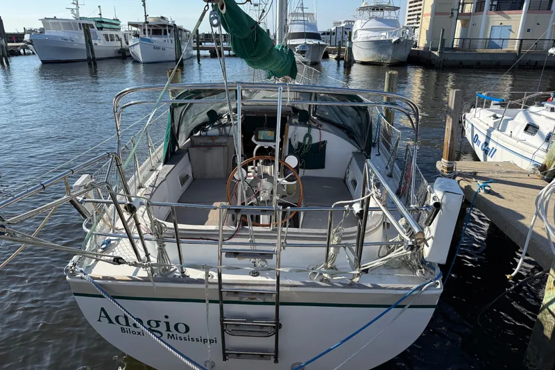 Slide: The Image of 1989 Nonsuch 30 Ultra sailboat docked in Biloxi, Mississippi marina. - 18