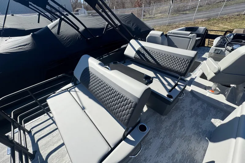 Slide: The Image of 2026 Sylvan L3 DLZ boat interior with luxurious seating and modern design. - 18